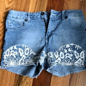 Denim shorts with lace.